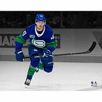 Elias Pettersson Vancouver Canucks Unsigned Blue Alternate Jersey Skating Spotlight Photograph