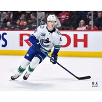 Elias Pettersson Vancouver Canucks Unsigned White Jersey Skating Photograph