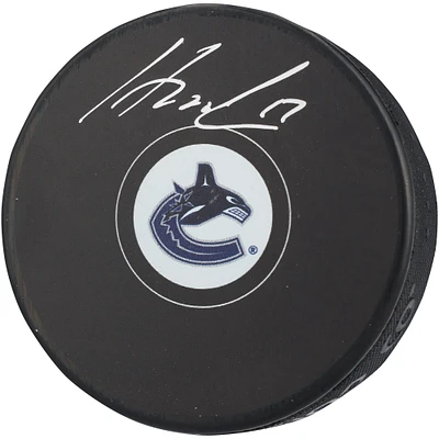 Filip Hronek Vancouver Canucks Autographed Hockey Puck 