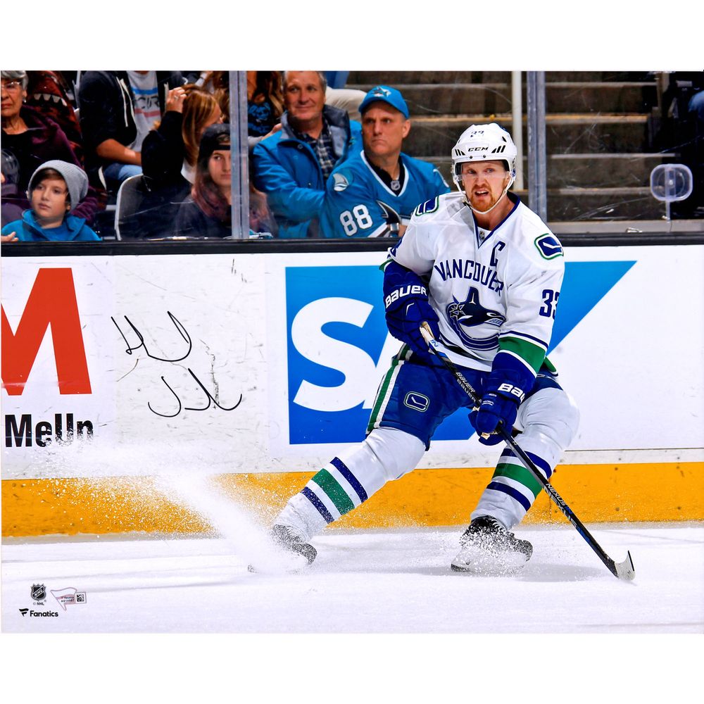 Henrik Sedin Vancouver Canucks Autographed 16" x 20" White Jersey Stopping Photograph