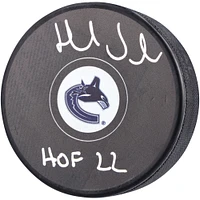 Henrik Sedin Vancouver Canucks Rondelle de hockey autographiée avec inscription "HOF 22"