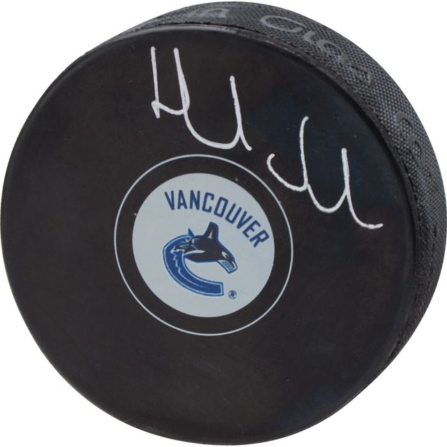 Rondelle de hockey autographiée des Canucks de Vancouver Henrik Sedin