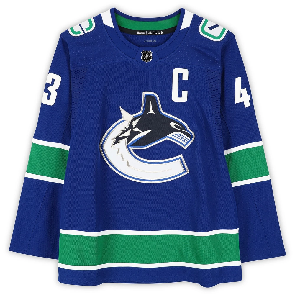 Quinn Hughes Vancouver Canucks Autographed Blue adidas Authentic Jersey with "2024 Norris" & "17G - 75A - 92 Pts" Inscriptions
