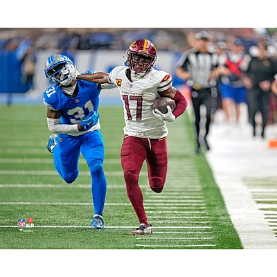 Terry McLaurin Washington Commanders Unsigned 2024 Playoffs Divisional Round Stiff-Arm Photograph