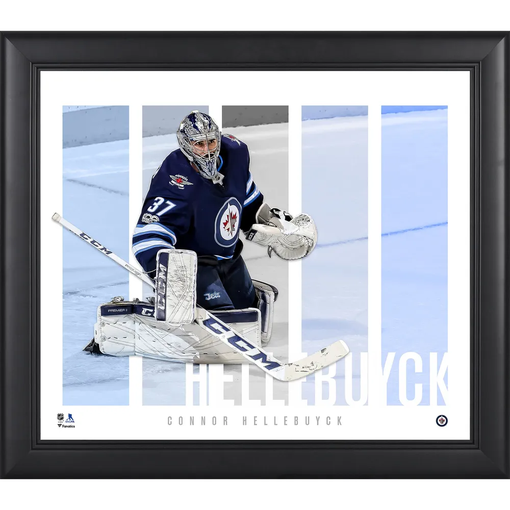 Connor Hellebuyck Winnipeg Jets Unsigned Reverse Retro Jersey in Net Photograph