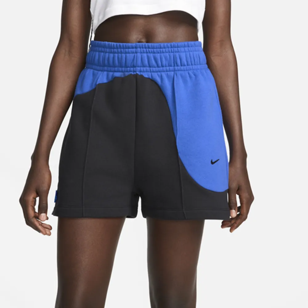 Nike Color Clash color block shorts in pale blue