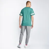 Nike T100