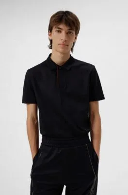 Cotton-blend polo shirt with covered placket