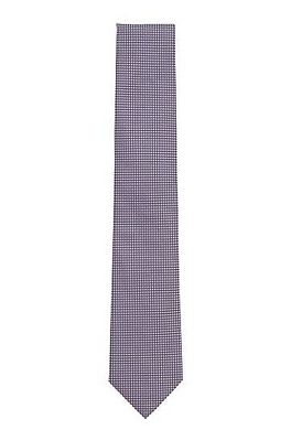 Cravate en jacquard de soie à motif géométrique