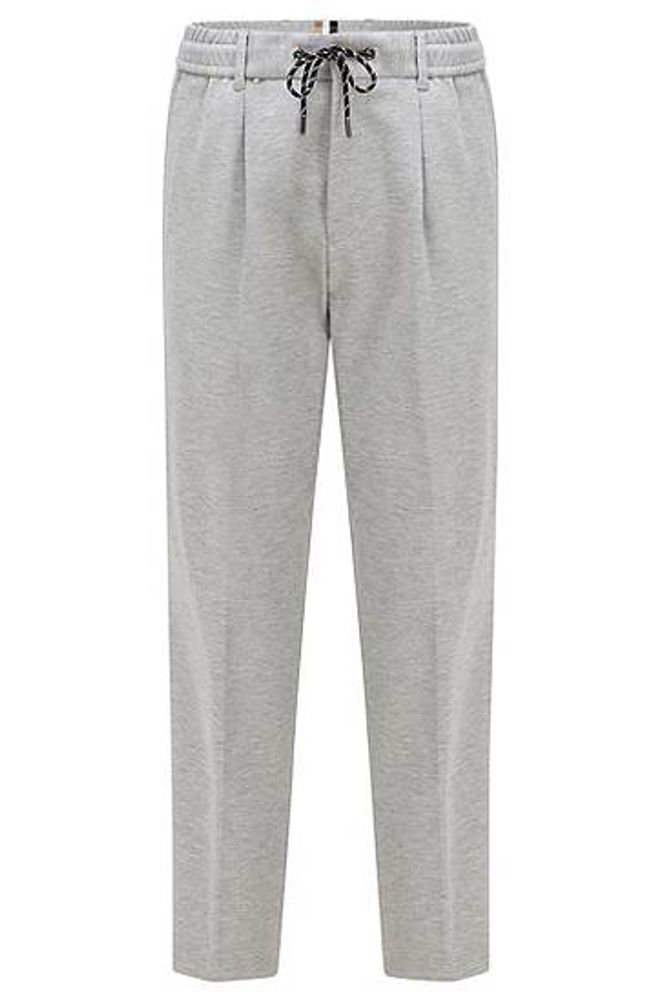 Pantalon Relaxed Fit court avec plis sur le devant