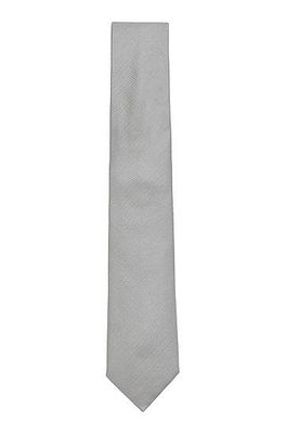 Cravate en jacquard de soie à micro motif avec passe-pan