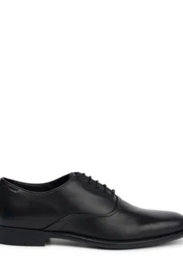 Leather Oxford shoes with rubber sole and laces