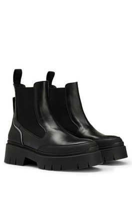 Bottines Chelsea en cuir avec semelle épaisse et tirants à ruban logo