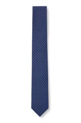 Hand-made tie in silk jacquard with dots
