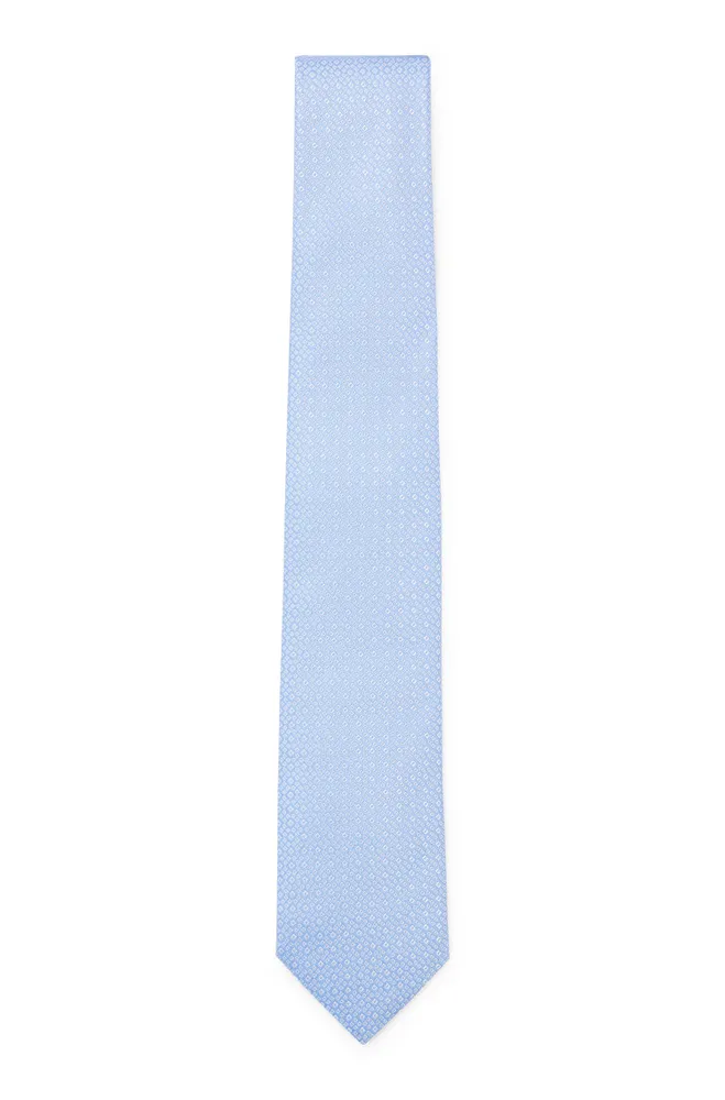 Carré de poche et cravate en jacquard de soie à micro motif