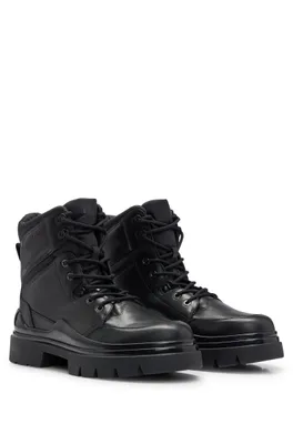Bottines mi-hautes en cuir avec semelle épaisse et logos