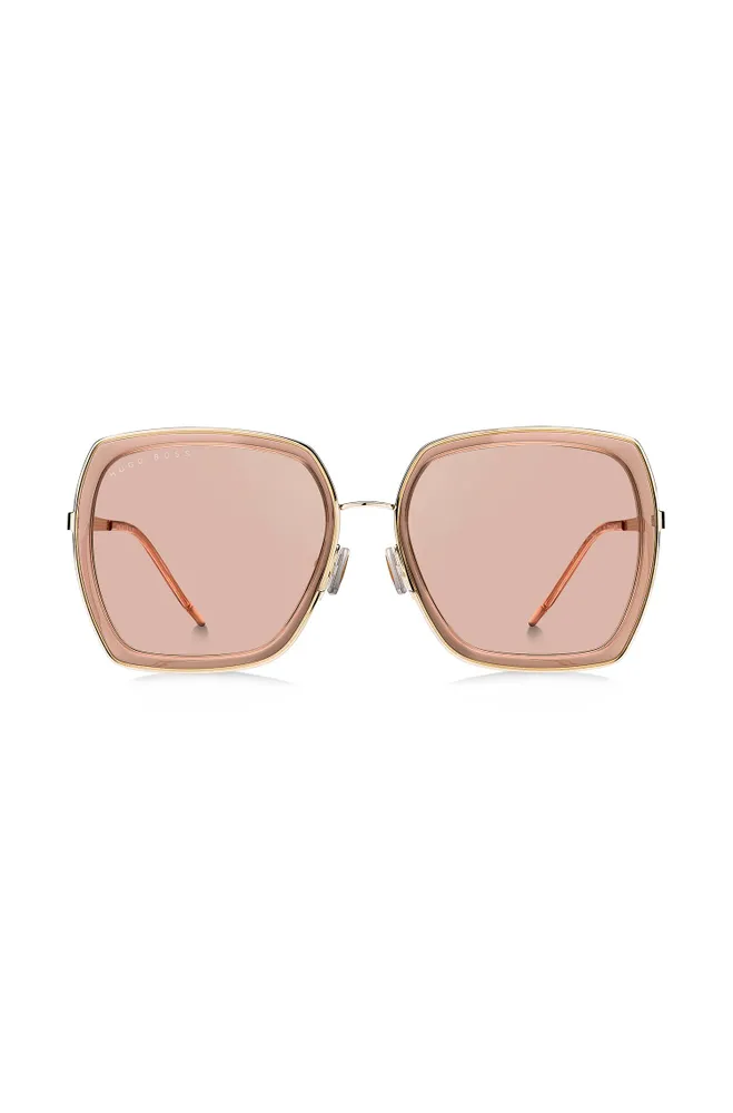 Lunettes de soleil angulaires en mélange de matières avec garnitures en métal emblématiques