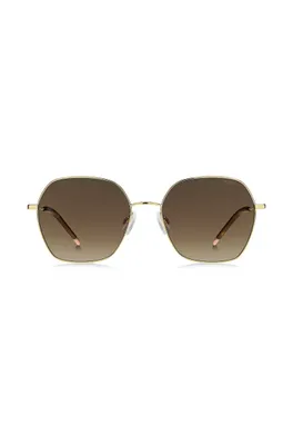 Lunettes de soleil dorées avec embouts en acétate Havana