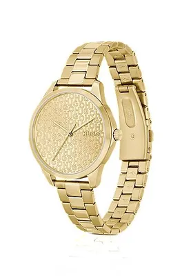 Montre dorée à cadran monogrammé
