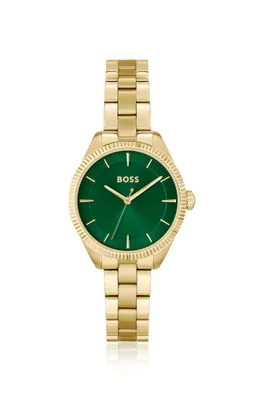 Relógio dourado com mostrador tonal verde