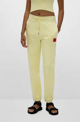 Pantalones de chándal en felpa algodón con etiqueta logo