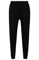 Cotton-terry tracksuit bottoms with logo patch