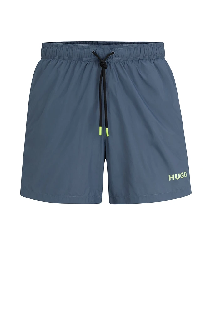 Fully lined swim shorts with logo print