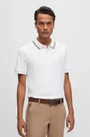 Polo slim fit de algodón con cuello a rayas