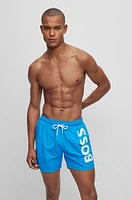 Quick-dry swim shorts with large logo print