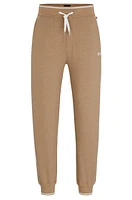 Pantalones de chándal ribeteados con logo bordado y cintura cordón
