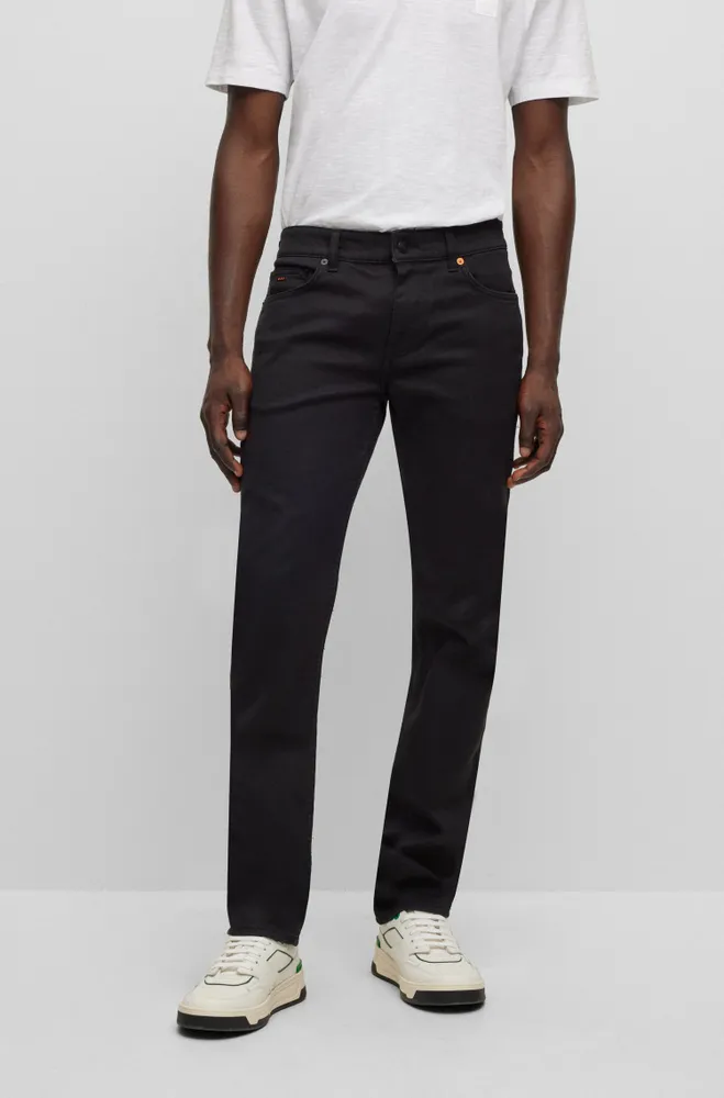 Vaqueros slim fit en denim elástico negro de gran comodidad