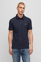 Polo slim fit de algodón elástico con parche logo