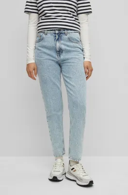 High-waisted jeans bleached-blue denim