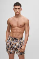 Floral-print swim shorts with logo detail