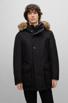 Water-repellent down jacket with faux-fur trimmed hood
