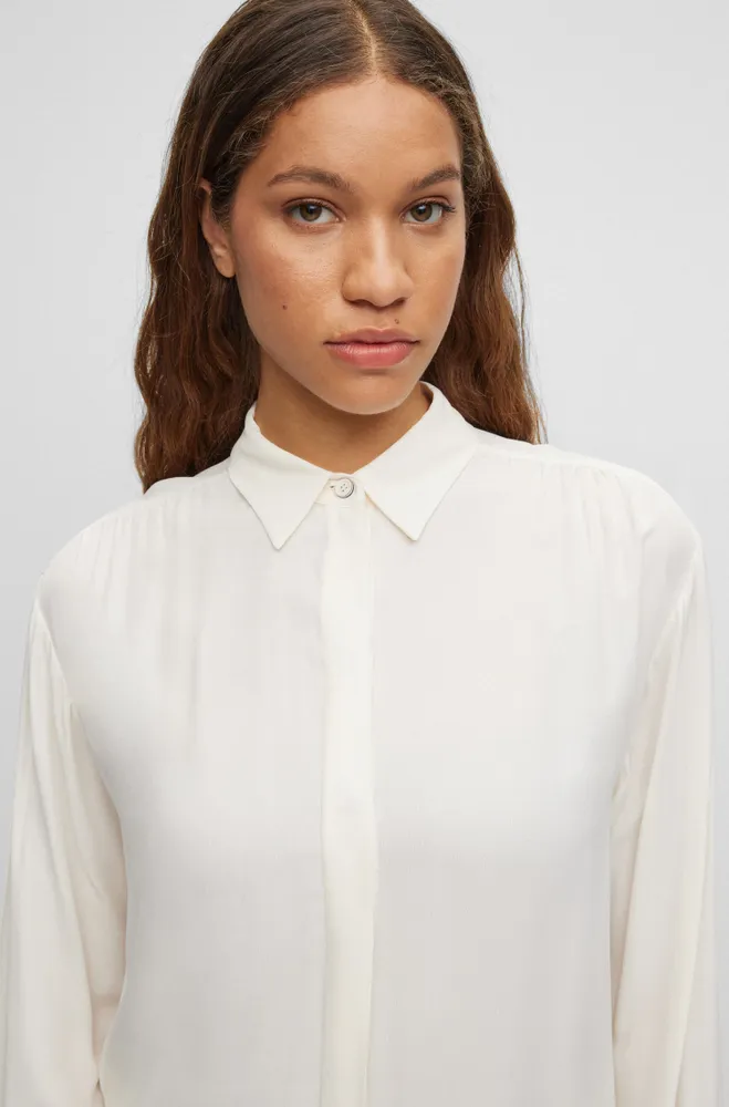 Long-length relaxed-fit blouse with concealed closure