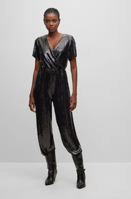 Stretch-jersey sequin jumpsuit with fixed wrap front