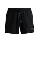 Fully lined swim shorts with logo detail