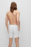 Swim shorts with handwritten logo