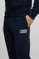 Pantalones de chándal en felpa rizo con logo estampado