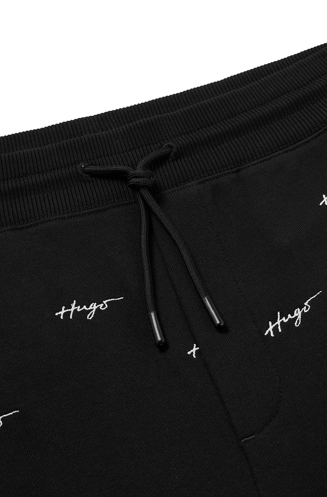 HUGO - Cotton-terry tracksuit bottoms with handwritten logo embroidery