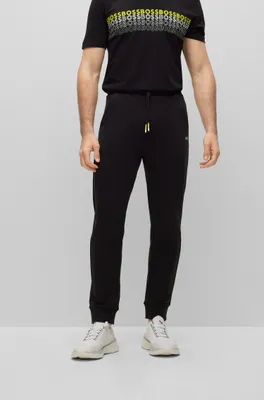 Cotton-blend tracksuit bottoms with embroidered logos