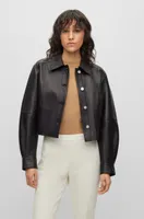 Cropped button-up leather jacket bonded with denim