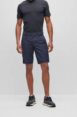 Shorts slim fit de sarga repelente al agua