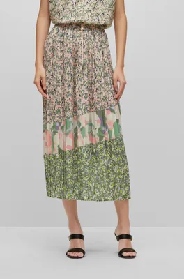 Plissé maxi skirt with all-over placed prints