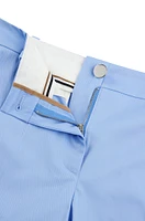 Pantalones regular fit de sarga algodón elástico