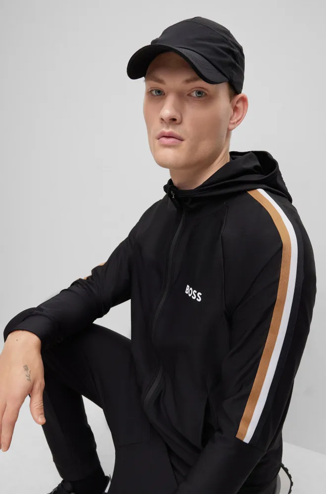 BOSS - BOSS x Matteo Berrettini Tracksuit bottoms in active-stretch fabric  with side stripes