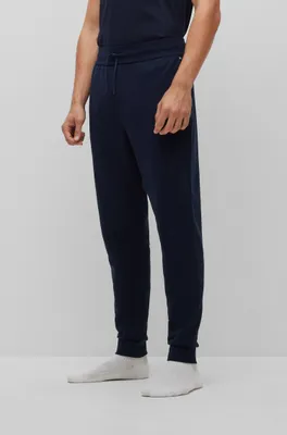 Cotton-terry loungewear tracksuit bottoms with embossed logo