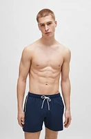 Swim shorts with signature stripe and logo