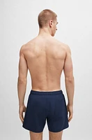 Swim shorts with signature stripe and logo